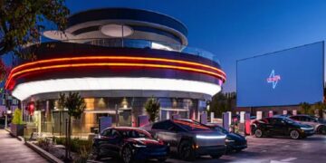 It's official - Tesla opens its first futuristic restaurant with drive-in movie theater, retro burgers and popcorn-serving robots