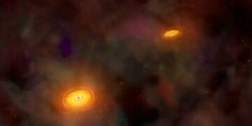 Confirmed by astronomers—the RadioAstron telescope captures the first direct image of two black holes orbiting each other and shooting jets of energy in unison